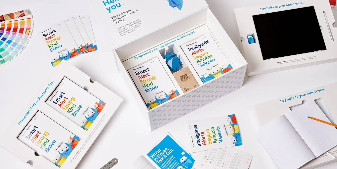 Custom white rigid set-up box with protective inserts and printed booklets engineered by Zenpack.