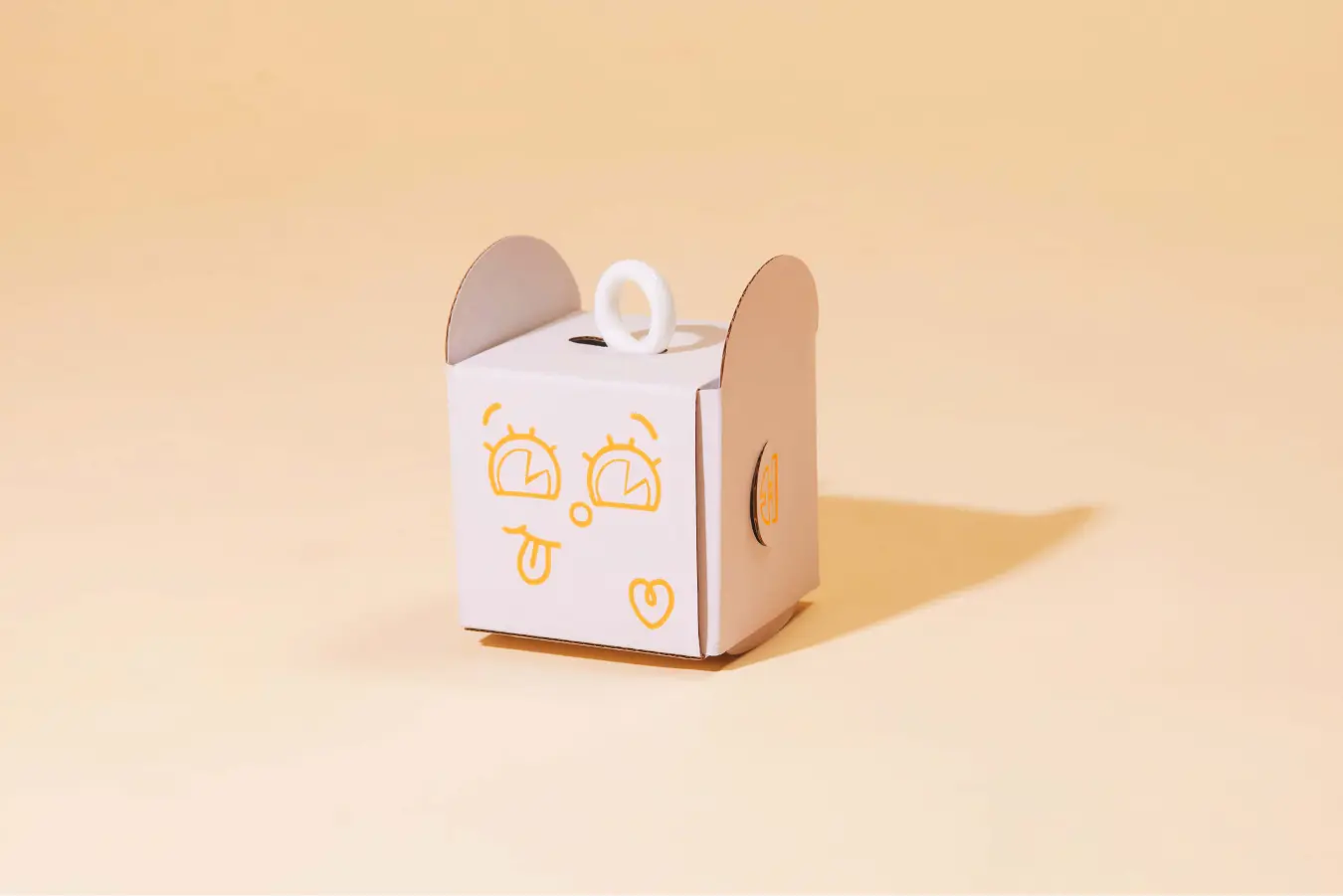 Minimalist Zenpack-designed packaging with playful iconography for educational toys