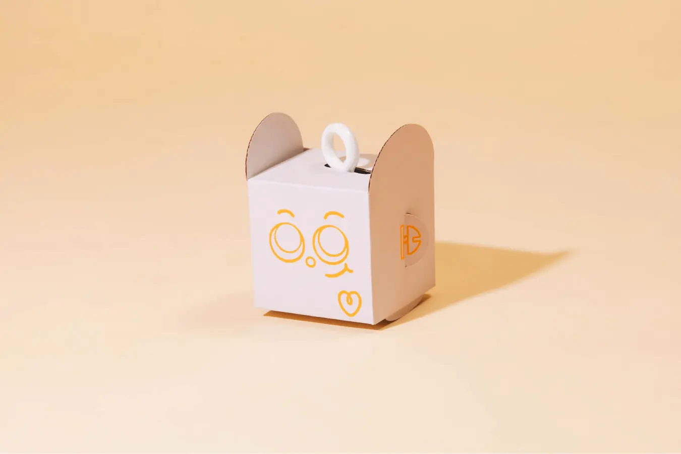 Minimalist Zenpack-designed packaging with playful iconography for educational toys