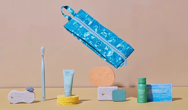 Tend dental care products with eco-friendly dental packaging design on a beige backdrop