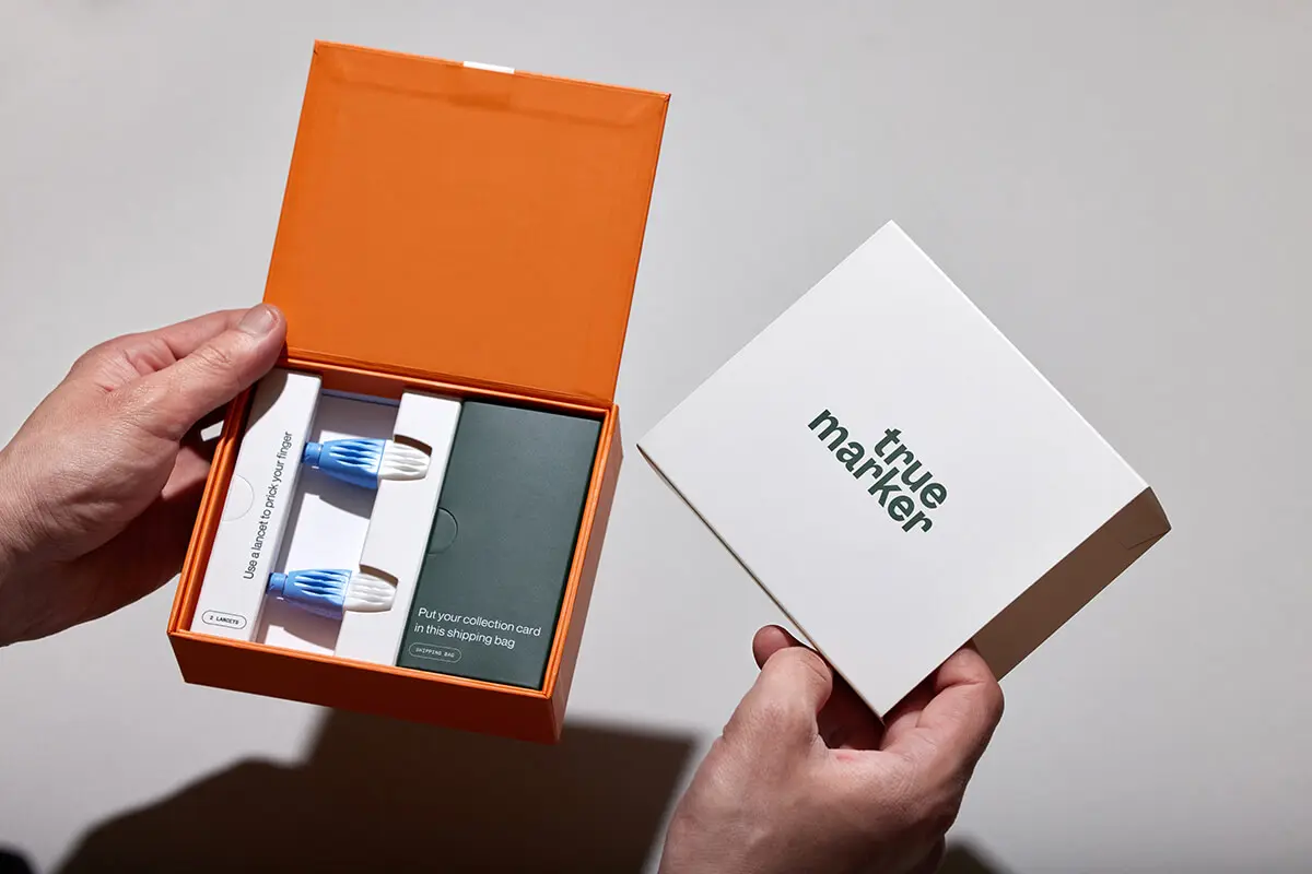 Custom medical test kit rigid box with organized compartments for True Marker by Zenpack.