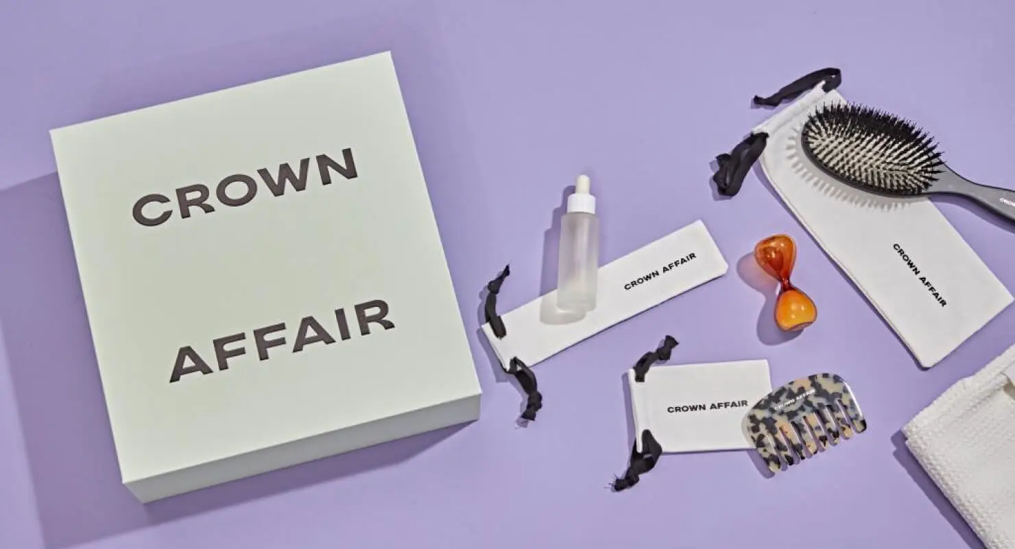 Custom SWAG sourcing and structural packaging engineering for Crown Affair