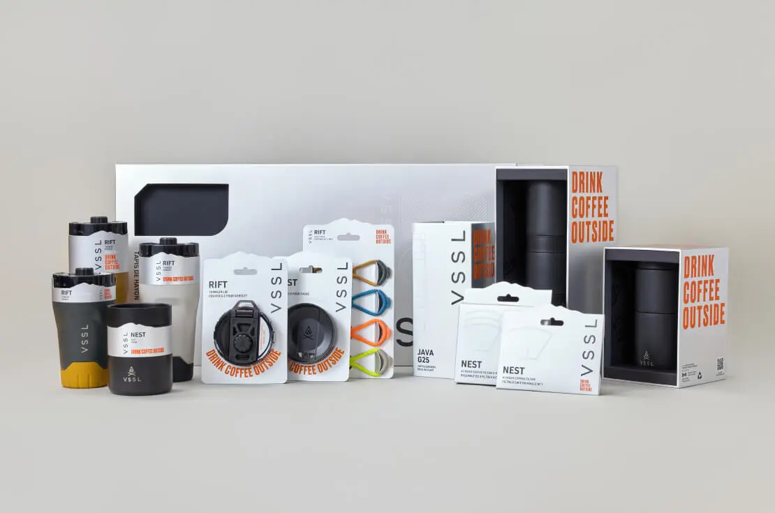 Showcase of VSSL "Drink Coffee Outside" custom packaging system including RIFT tumblers, Java grinder, and NEST filters