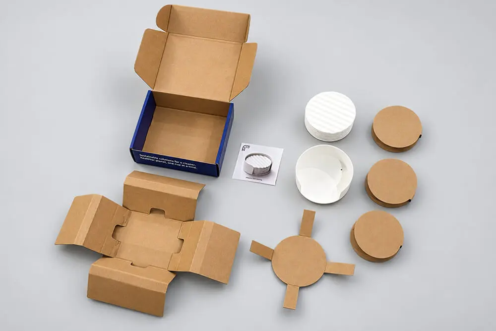 Pack-ready corrugated box and custom paper inserts engineered by Zenpack for efficient assembly.