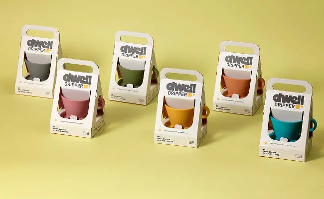 Zenpack custom retail packaging boxes displaying colorful Dwell Dripper coffee cups for retail shelf displays.