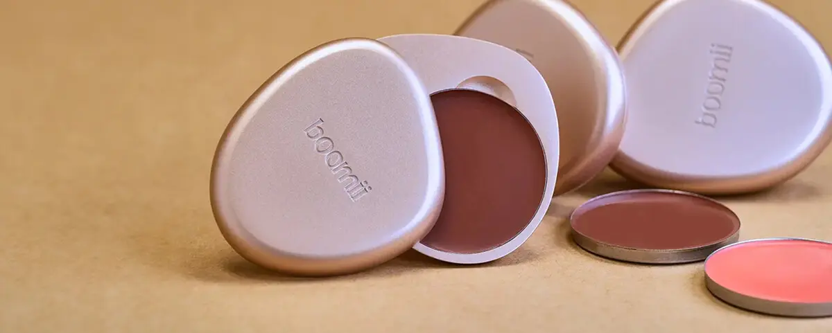 Custom cosmetic packaging design for boumii refillable compacts by Zenpack.