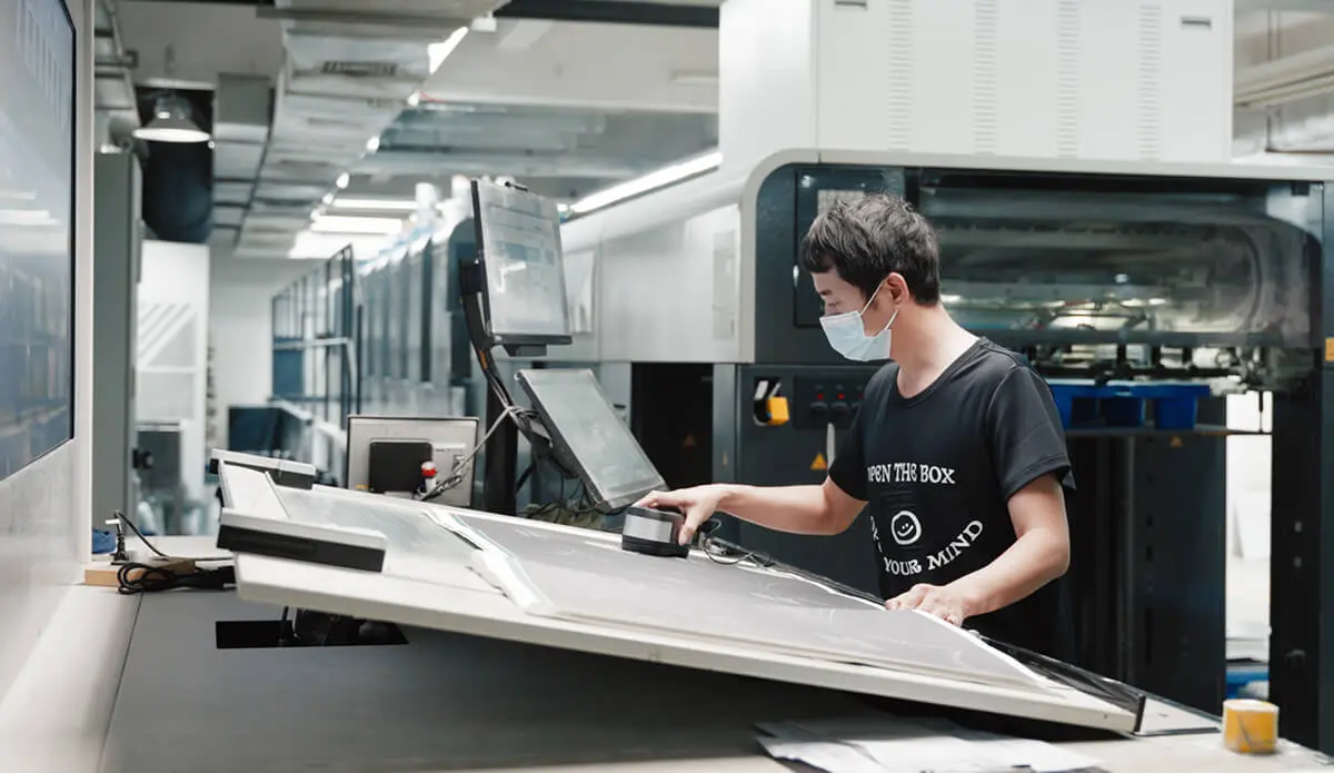 Zenpack in-house printing production and quality control with exact color matching.