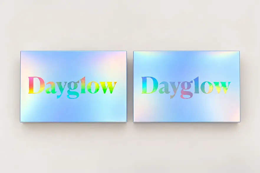 Custom Dayglow rigid secondary presentation boxes with holographic finish by Zenpack.