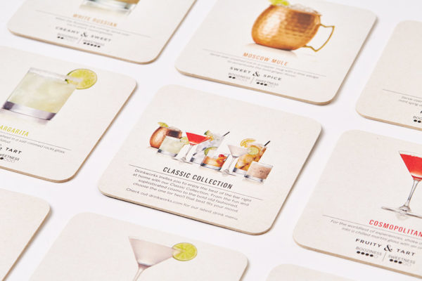 Assorted Drinkworks coasters designed by Zenpack, highlighting classic cocktail selections