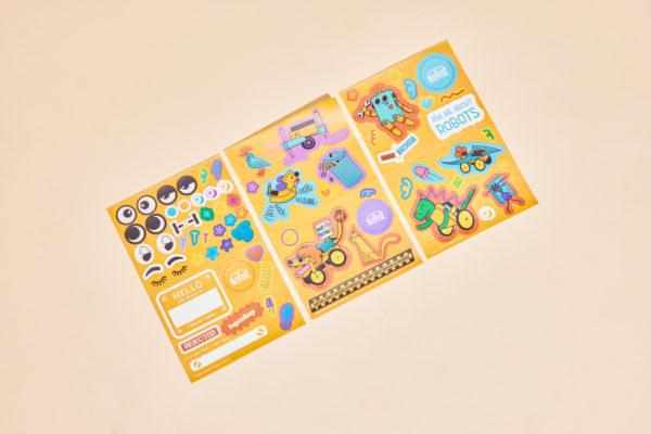 Brightly colored Brooklyn Robot Foundry toy packaging with fun stickers, designed by Zenpack