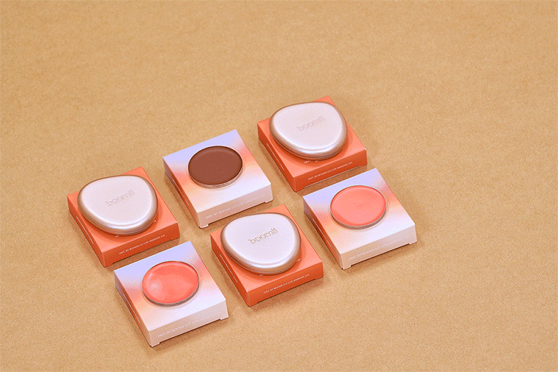 Sustainable paperboard refill boxes for Boomii cosmetic compacts by Zenpack.